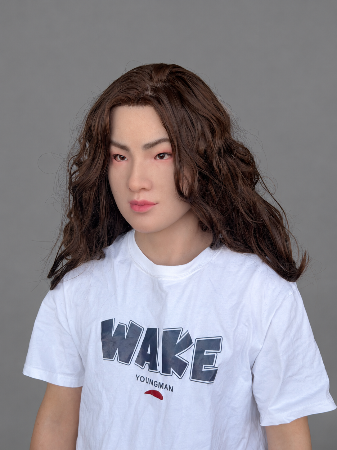 Silicone Mask of a Woman with Long, Wavy Hair