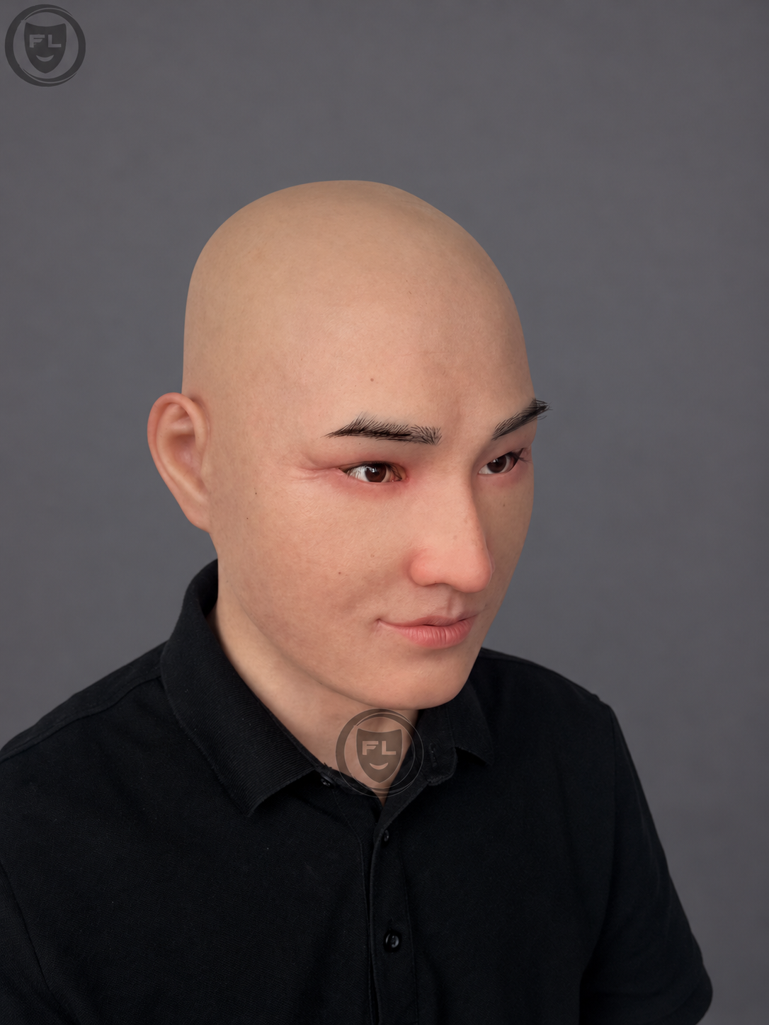 Realistic middle-aged silicone mask with a bald Asian face