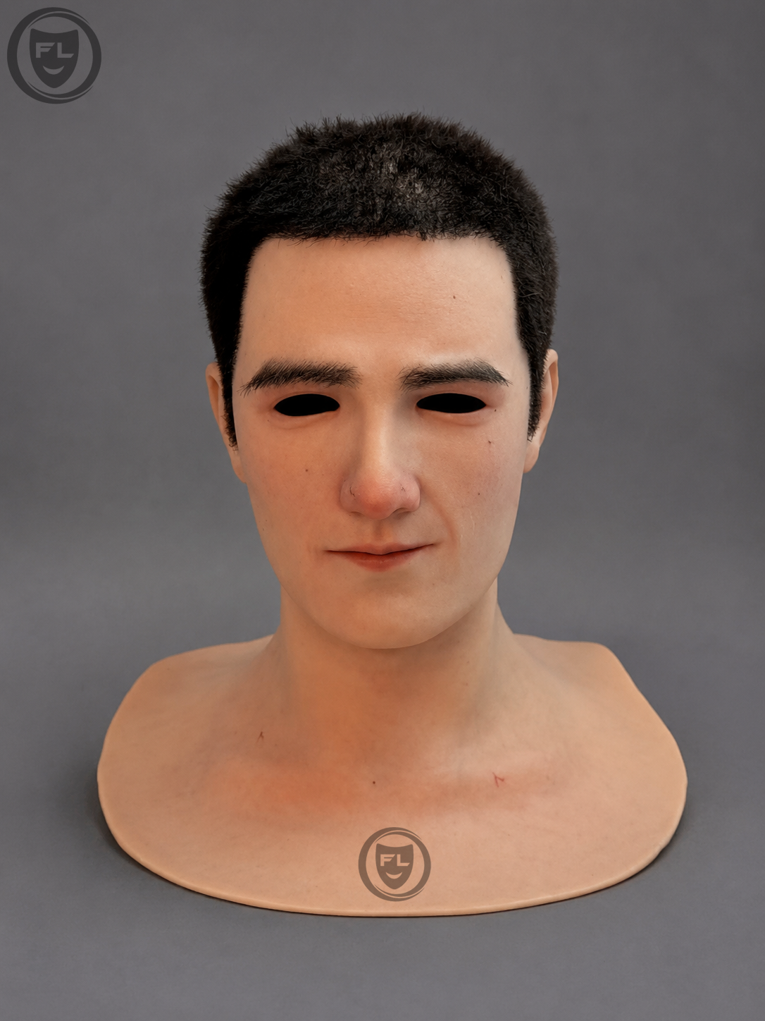 Ethan realistic silicone mask with short black hair displayed from front