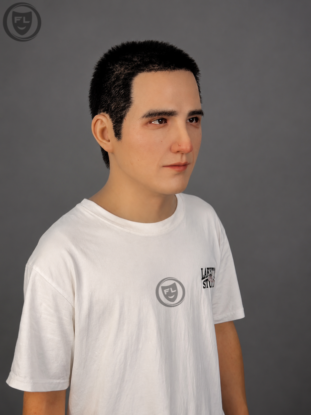 Realistic young male silicone mask worn from left side angle