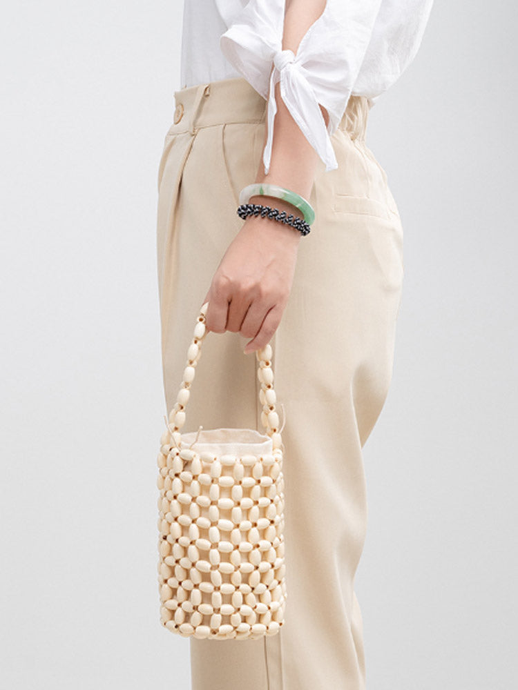 Hollowed-Out Wooden Bead Woven Bucket Bag-CALLISTARI