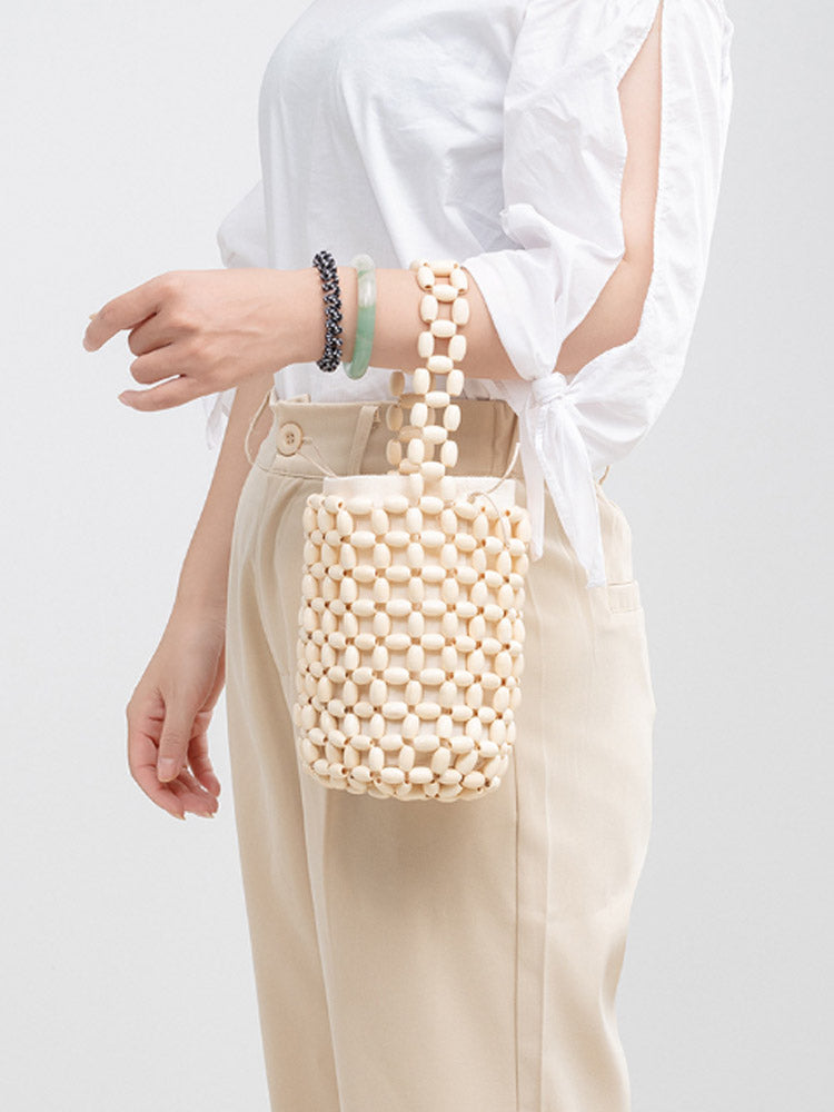 Hollowed-Out Wooden Bead Woven Bucket Bag-CALLISTARI