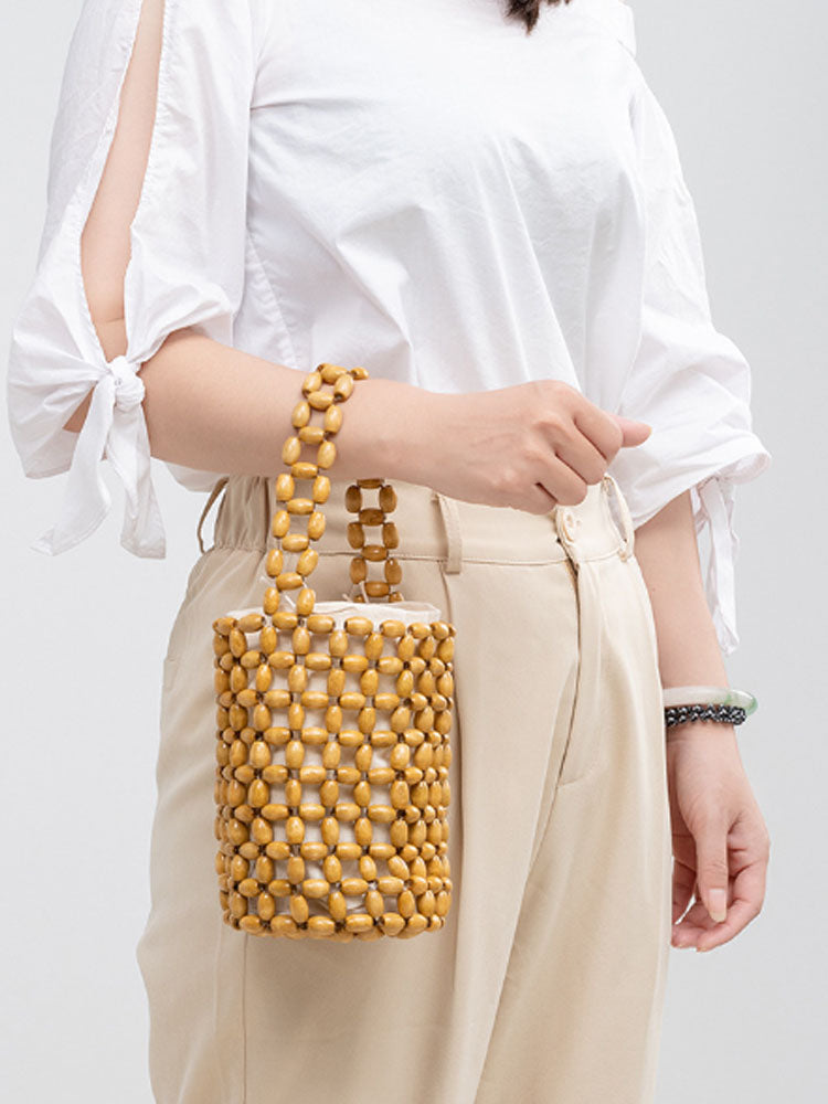Hollowed-Out Wooden Bead Woven Bucket Bag-CALLISTARI