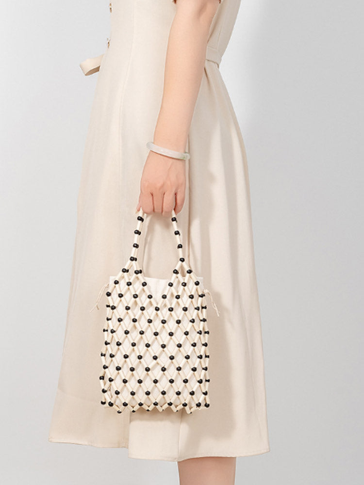 Hollow-Out Wooden Bead Woven Tote Bag-CALLISTARI