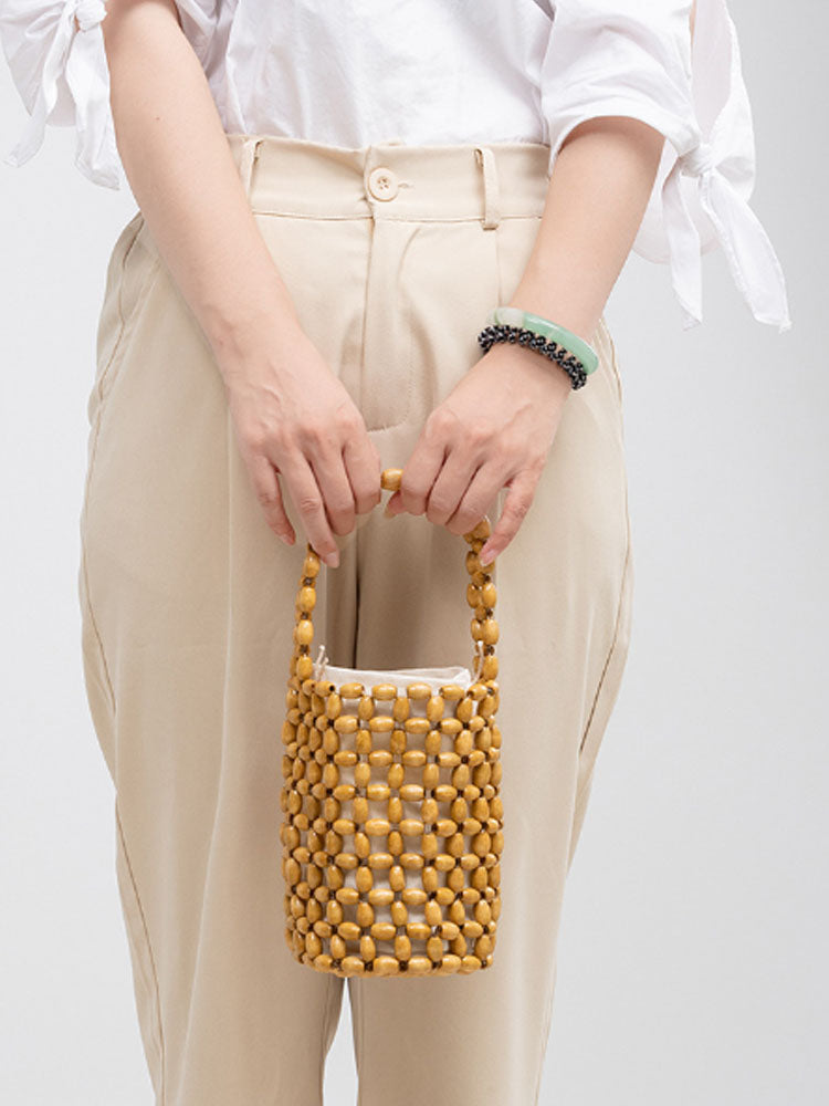 Hollowed-Out Wooden Bead Woven Bucket Bag-CALLISTARI