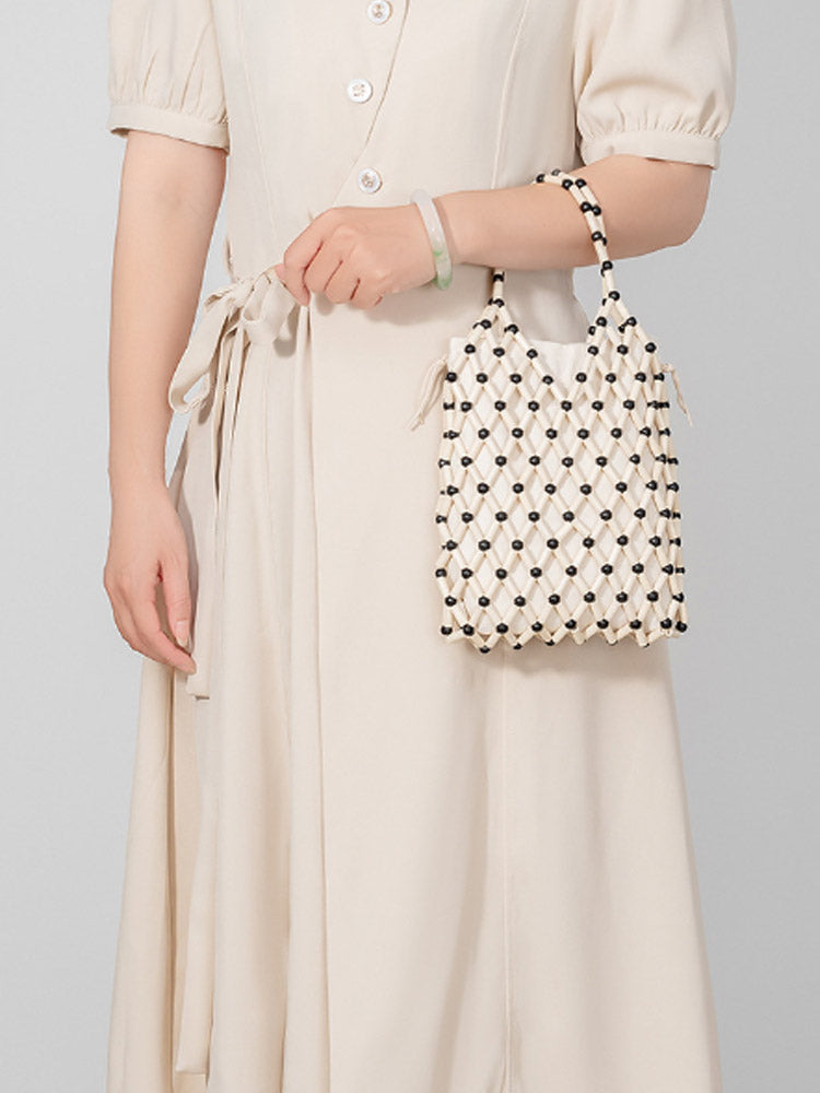 Hollow-Out Wooden Bead Woven Tote Bag-CALLISTARI