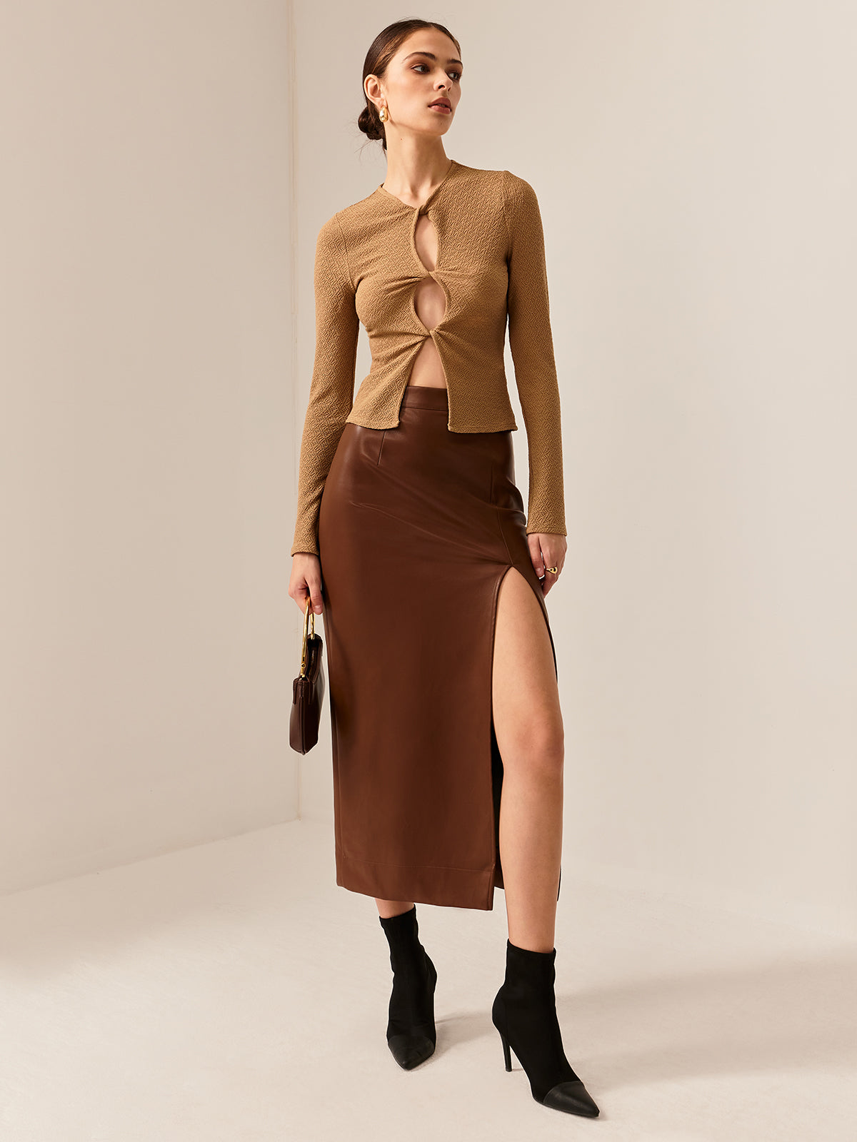 Callistari Cutout Twist Slim Blouse-CALLISTARI