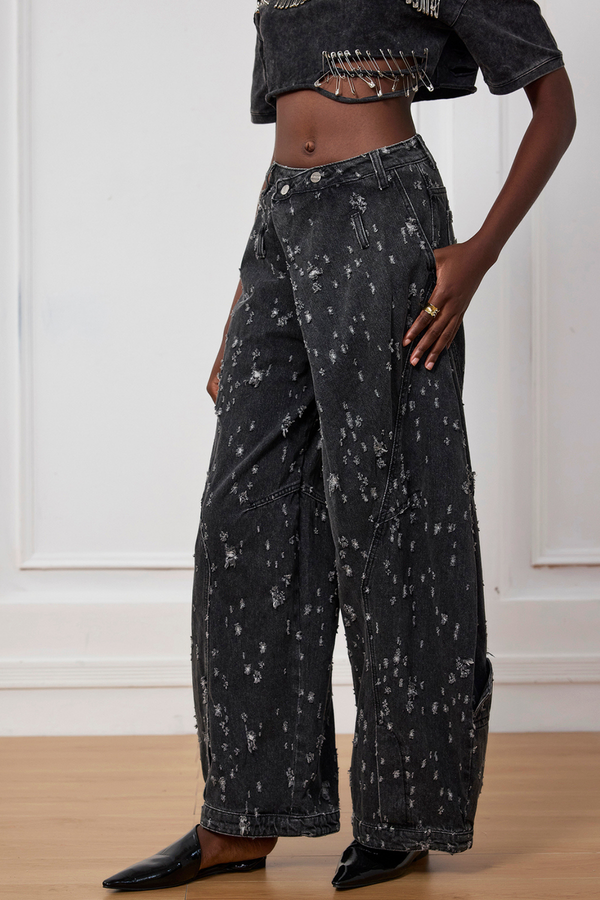 Torn Asymmetric Jeans