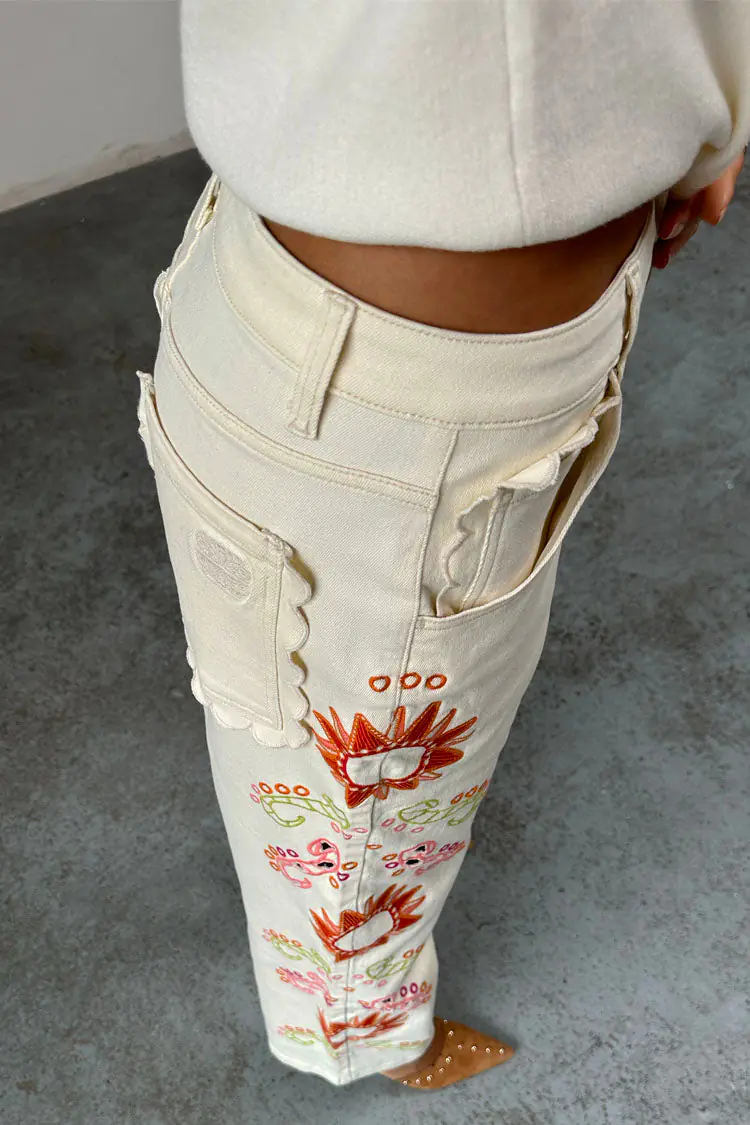 Designer embroidered ecru jeans