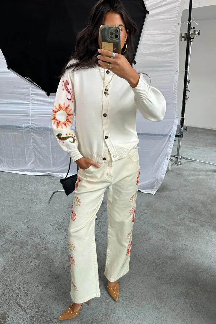 Designer embroidered ecru jeans