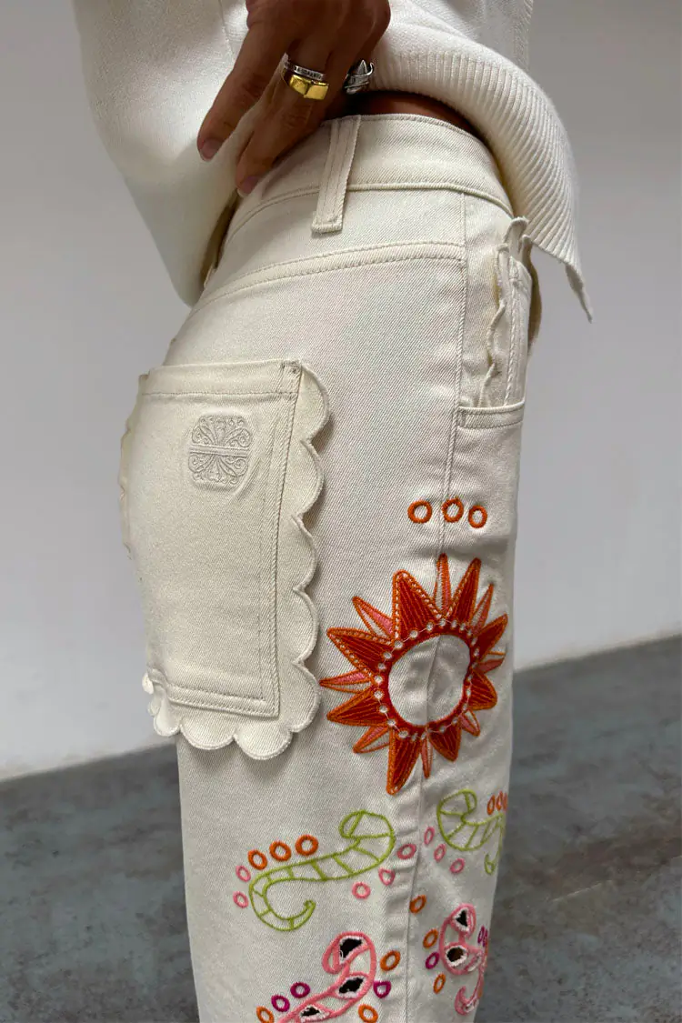 Designer embroidered ecru jeans