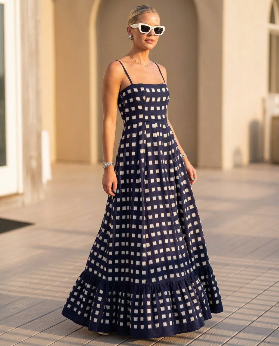 Navy Eyelet V-Neck Maxi Dress "Serena" Navy Maxi Dress with Relaxed Fit silhouette and Textured texture, editorial ecommerce scene for Resort Wear, a polished coastal brunch, US East / Hamptons Elite