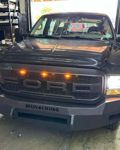 For 1999-2004 Ford F250 F350 Super Duty Grill Raptor Style Front Grille with Light and Letter Matte Black