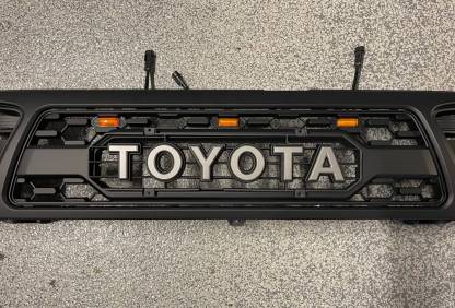 Front Grill For Toyota Tacoma 1995-1996 Grille With LED Light & Letter Matte Black