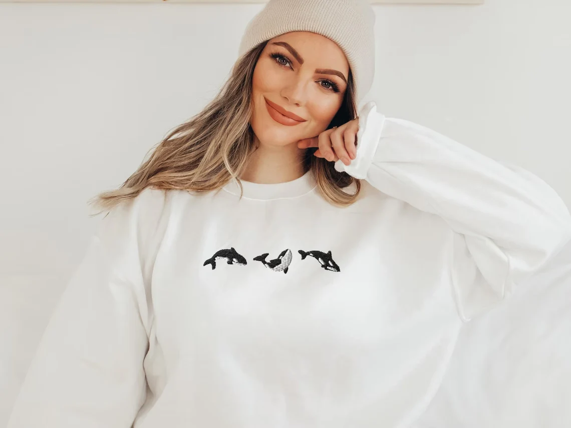 Embroidered Trio of Orcas Sweatshirt
