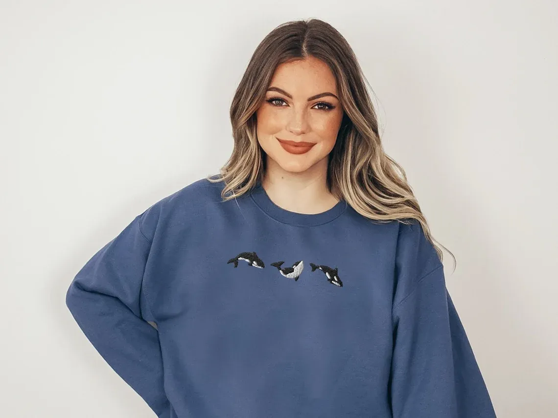 Embroidered Trio of Orcas Sweatshirt