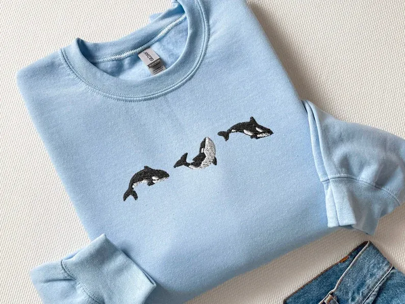 Embroidered Trio of Orcas Sweatshirt
