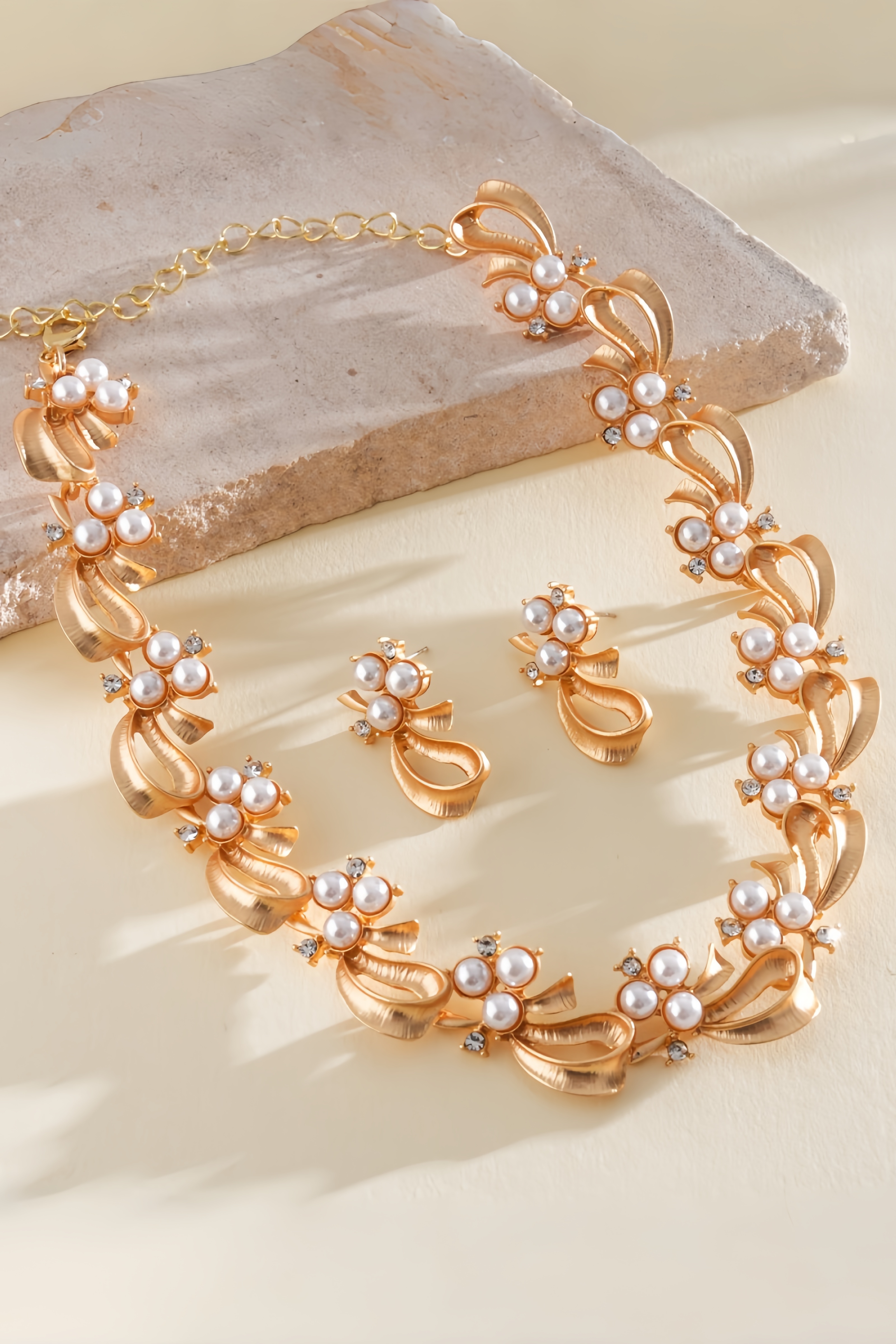 Calceby Pearl Bow Earrings Necklaces