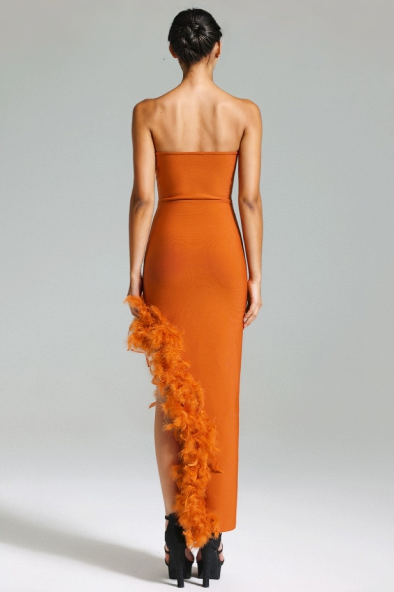 Yeli Feather Slant Hem Bandage Maxi Dress