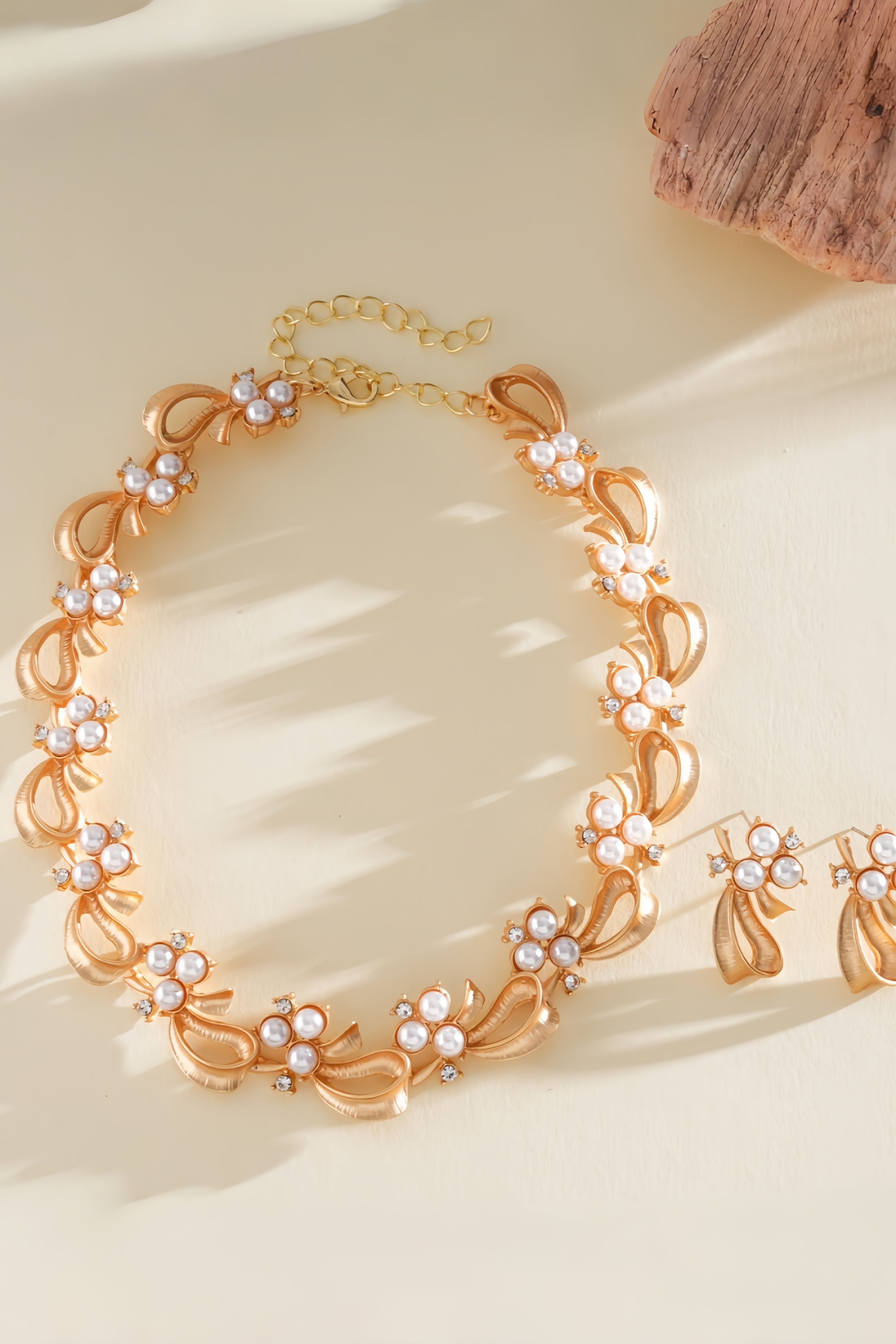 Calceby Pearl Bow Earrings Necklaces