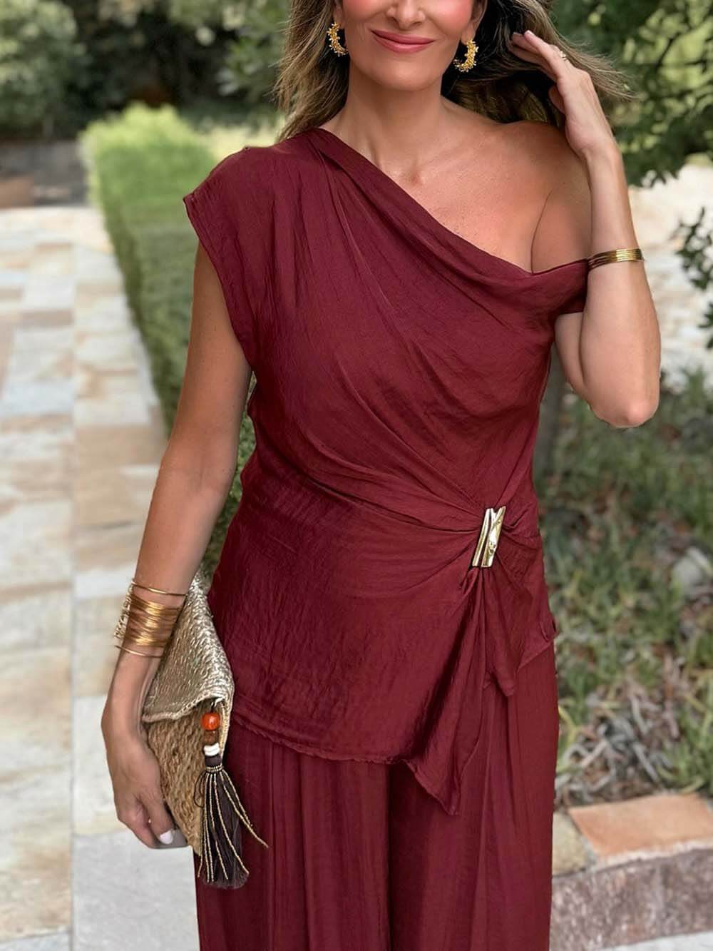 Unique Asymmetric Hem Metallic Accents Top