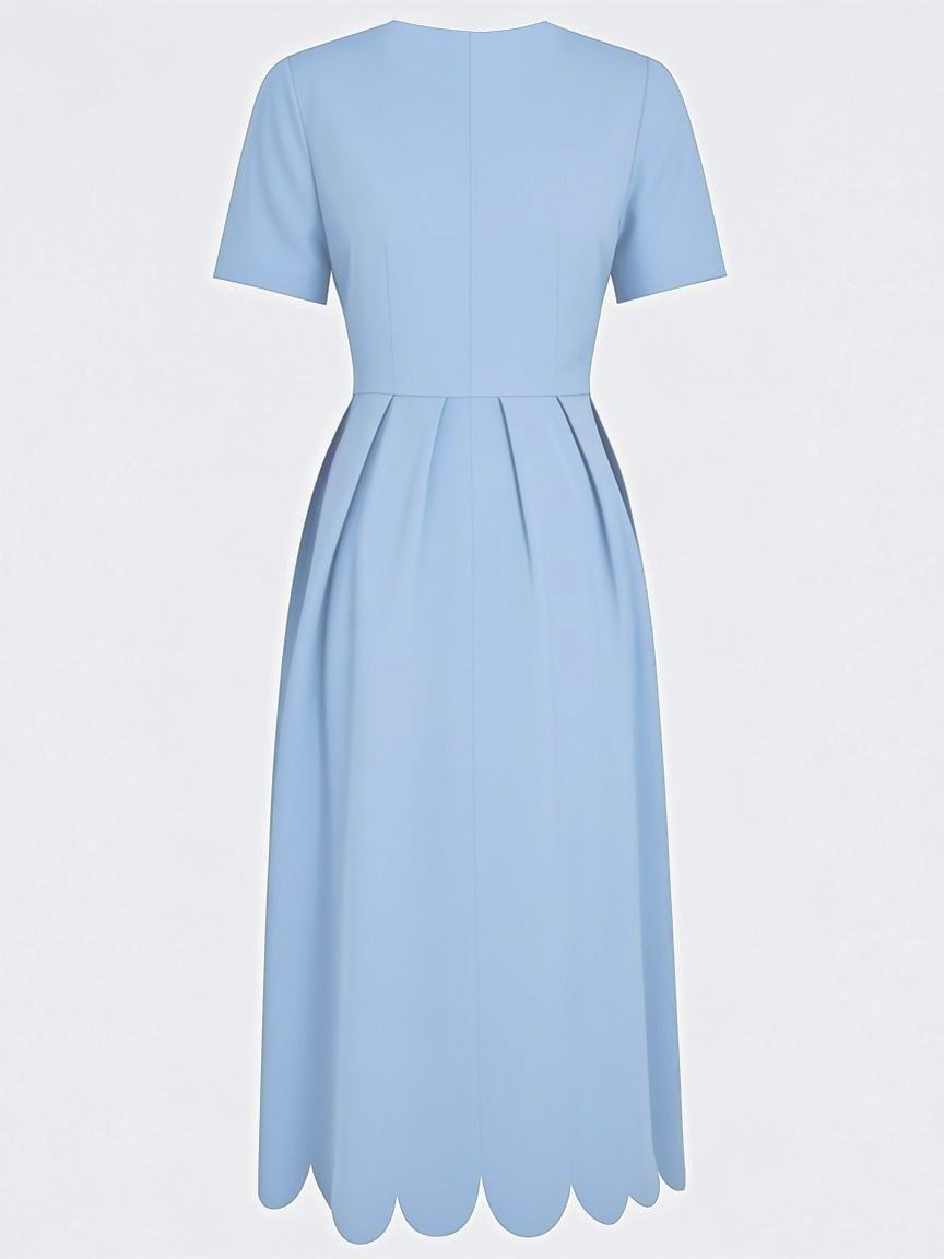 Elegante vestido midi de corte A con bajo ondulado
