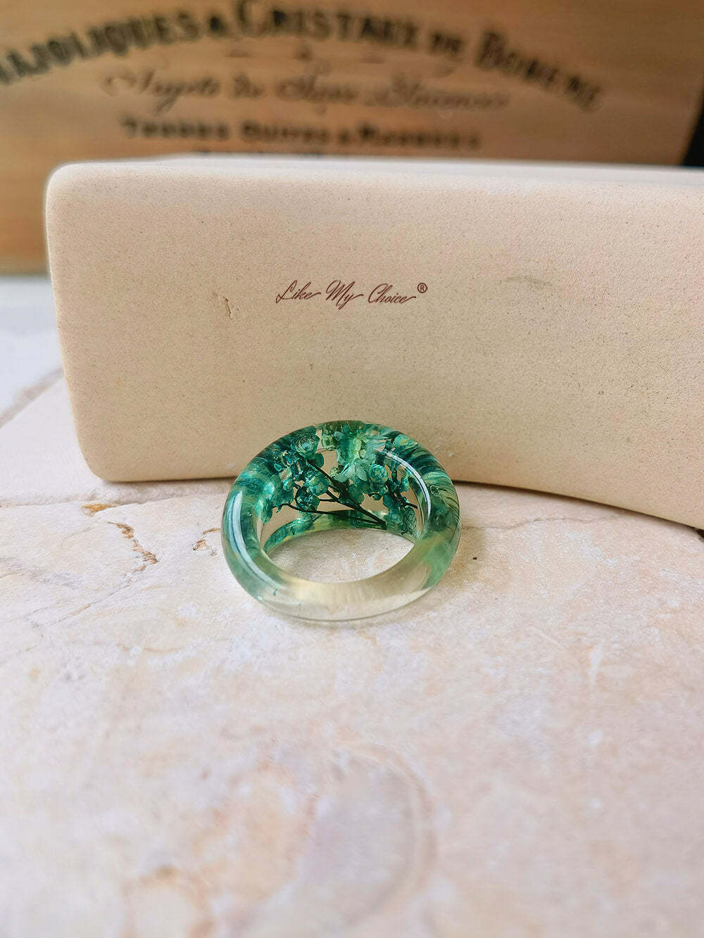 Dried flower resin ring with green flowers