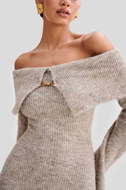Off-the-shoulder knitted sweater dress, form-fitting, hip-hugging style.