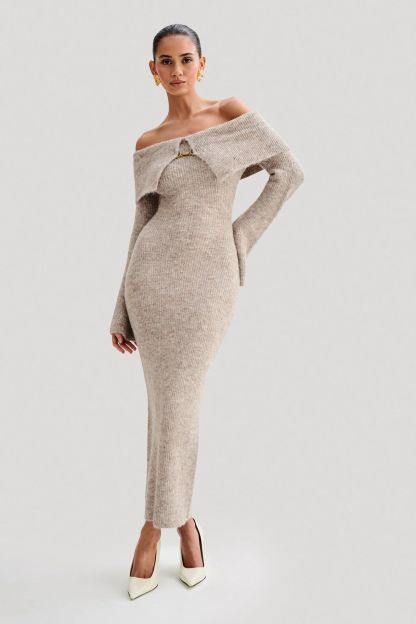 Off-the-shoulder knitted sweater dress, form-fitting, hip-hugging style.