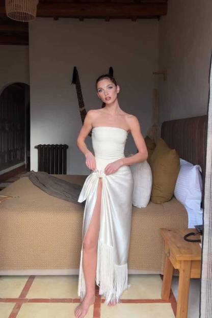 Bodysuit And Tassel Skirt Set