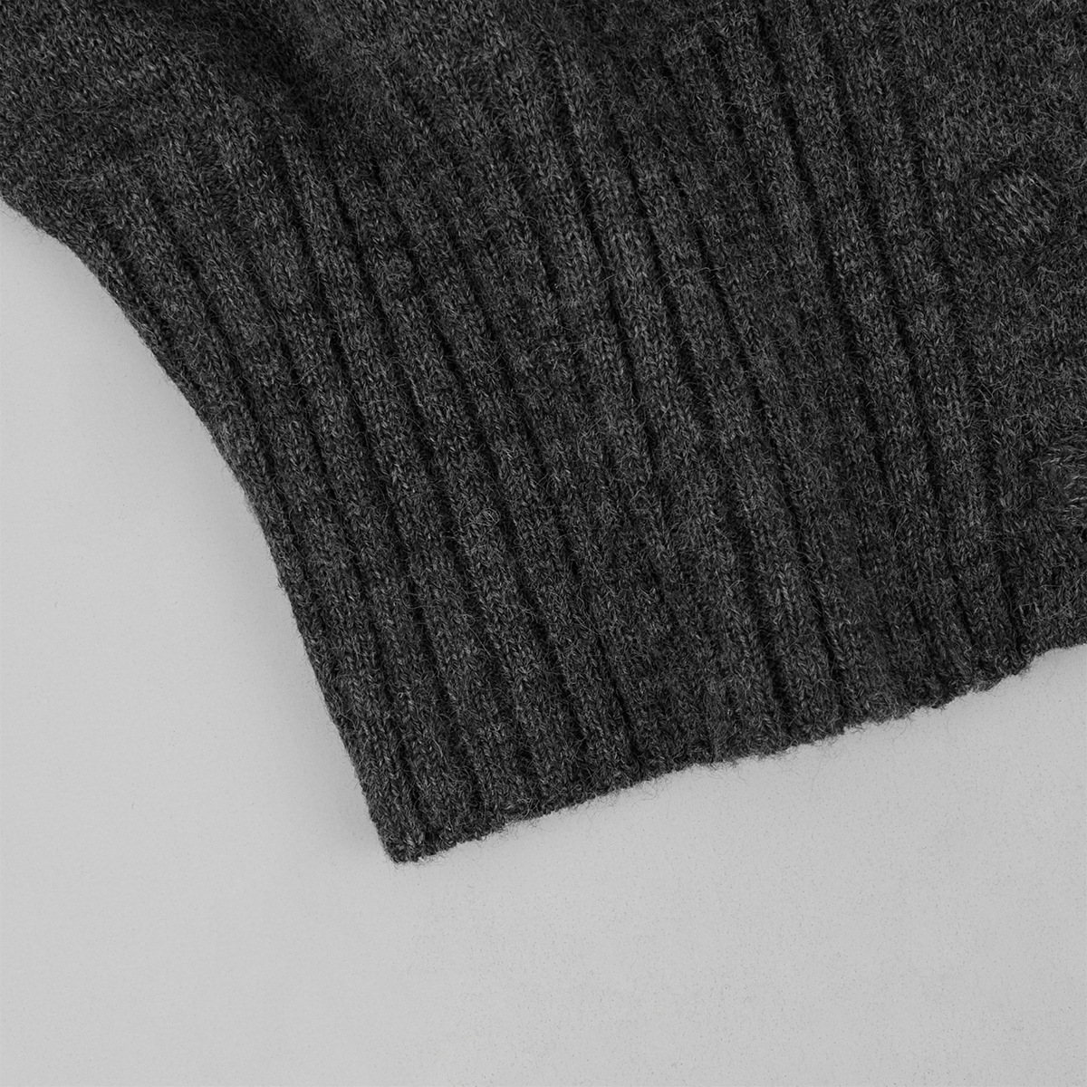 Two-piece set: fitted knit cardigan and knit mini skirt