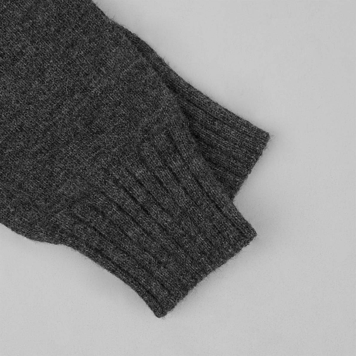Two-piece set: fitted knit cardigan and knit mini skirt
