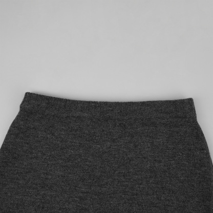 Two-piece set: fitted knit cardigan and knit mini skirt