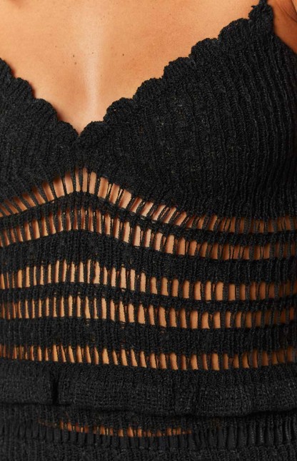 Ausha Black Knit Mini Dress-Vavasi.All Rights Reserved.