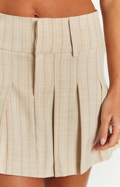 Azari Cream Pleated Mini Skirt-Vavasi.All Rights Reserved.