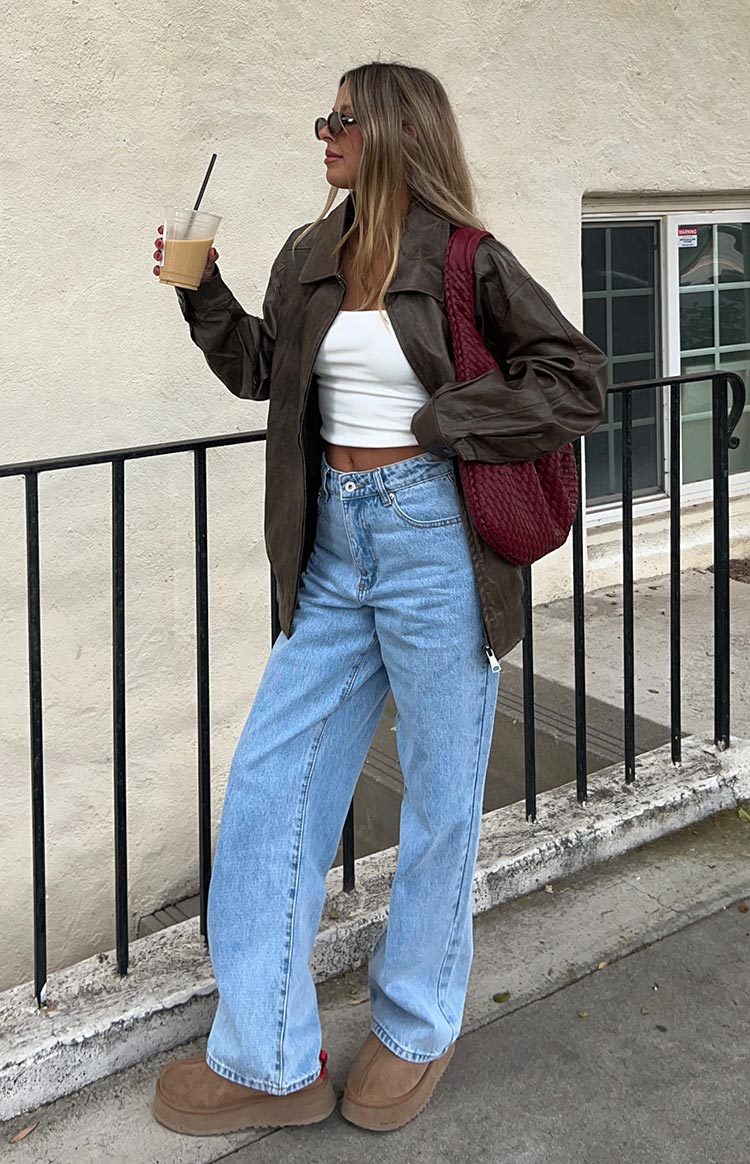 Calliope Light Wash Mid Rise Slouchy Jeans-Vavasi.All Rights Reserved.