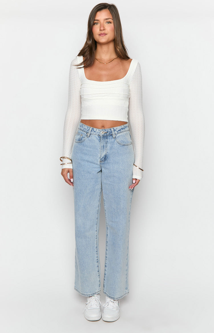 Calliope Light Wash Mid Rise Slouchy Jeans-Vavasi.All Rights Reserved.