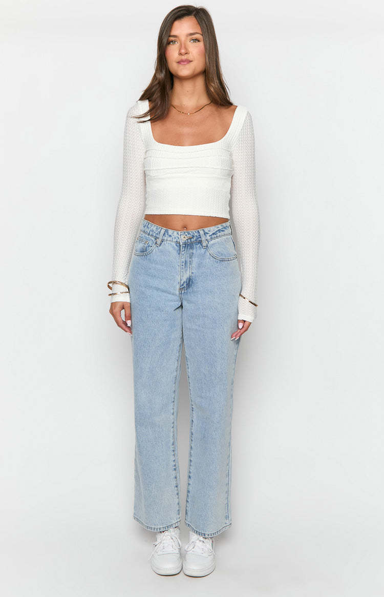 Calliope Light Wash Mid Rise Slouchy Jeans-Vavasi.All Rights Reserved.