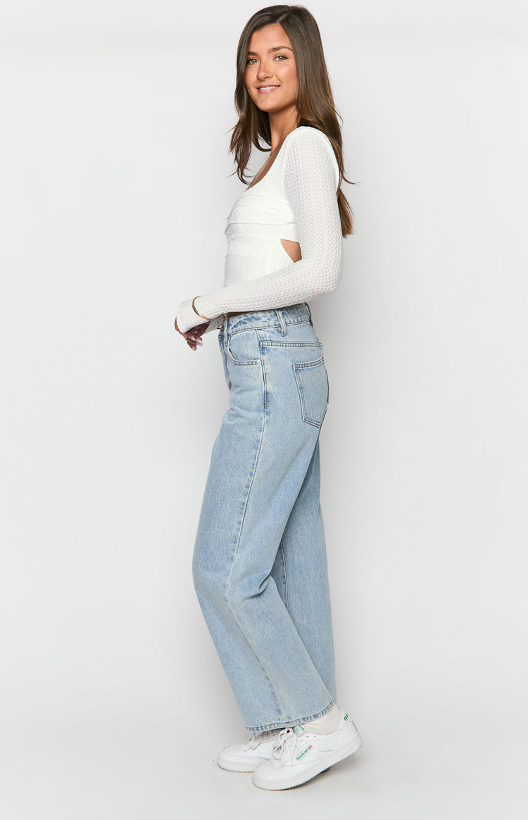 Calliope Light Wash Mid Rise Slouchy Jeans-Vavasi.All Rights Reserved.