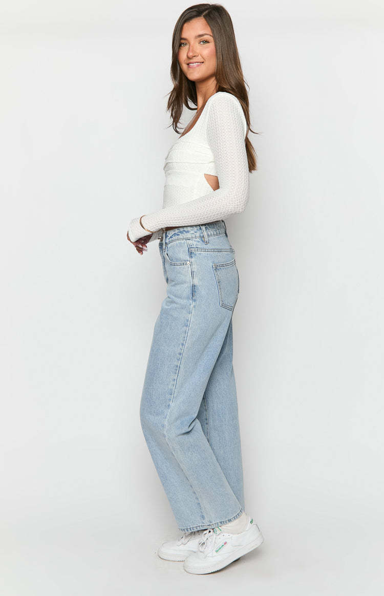 Calliope Light Wash Mid Rise Slouchy Jeans-Vavasi.All Rights Reserved.