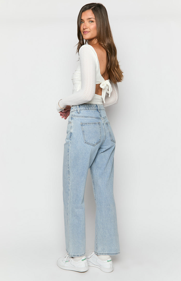 Calliope Light Wash Mid Rise Slouchy Jeans-Vavasi.All Rights Reserved.