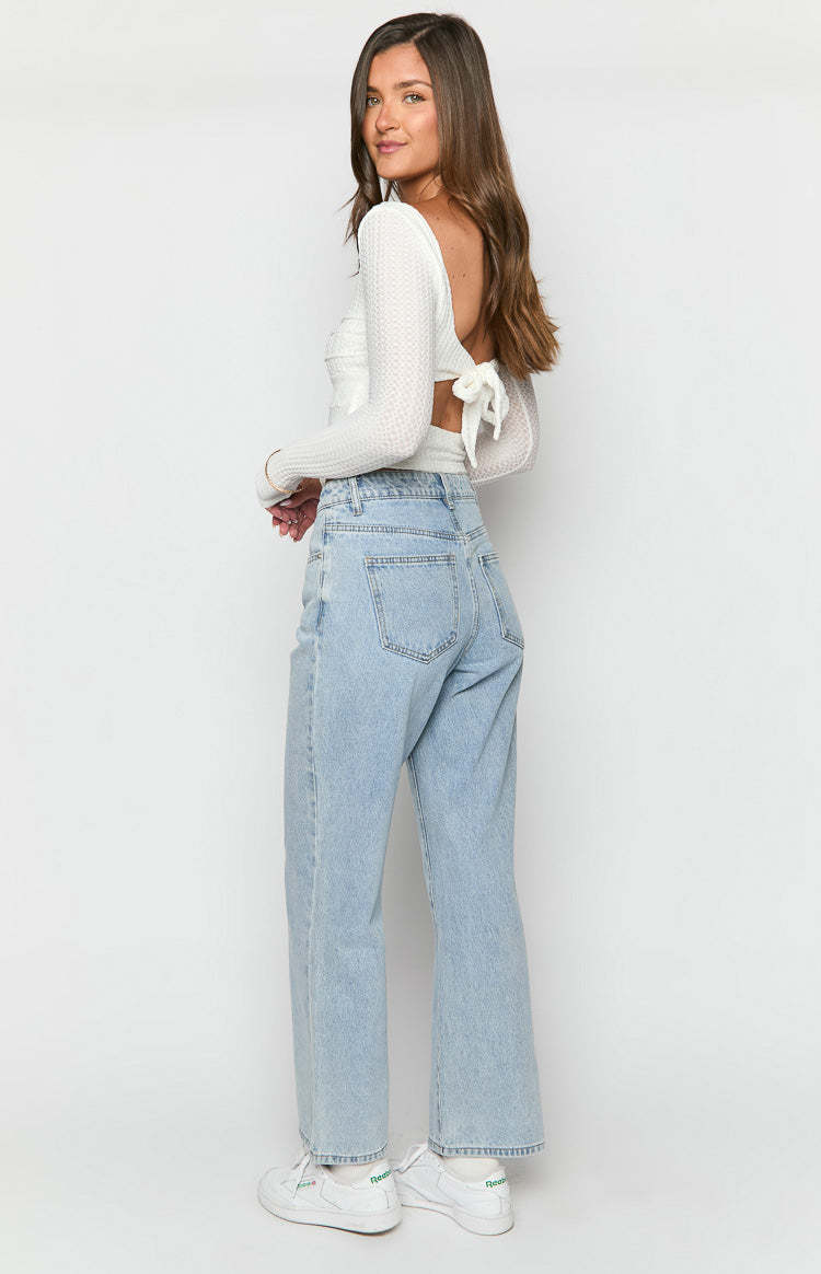 Calliope Light Wash Mid Rise Slouchy Jeans-Vavasi.All Rights Reserved.