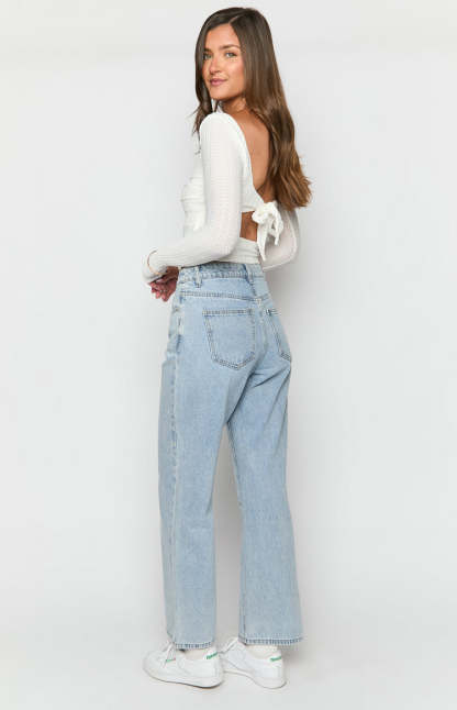 Calliope Light Wash Mid Rise Slouchy Jeans-Vavasi.All Rights Reserved.