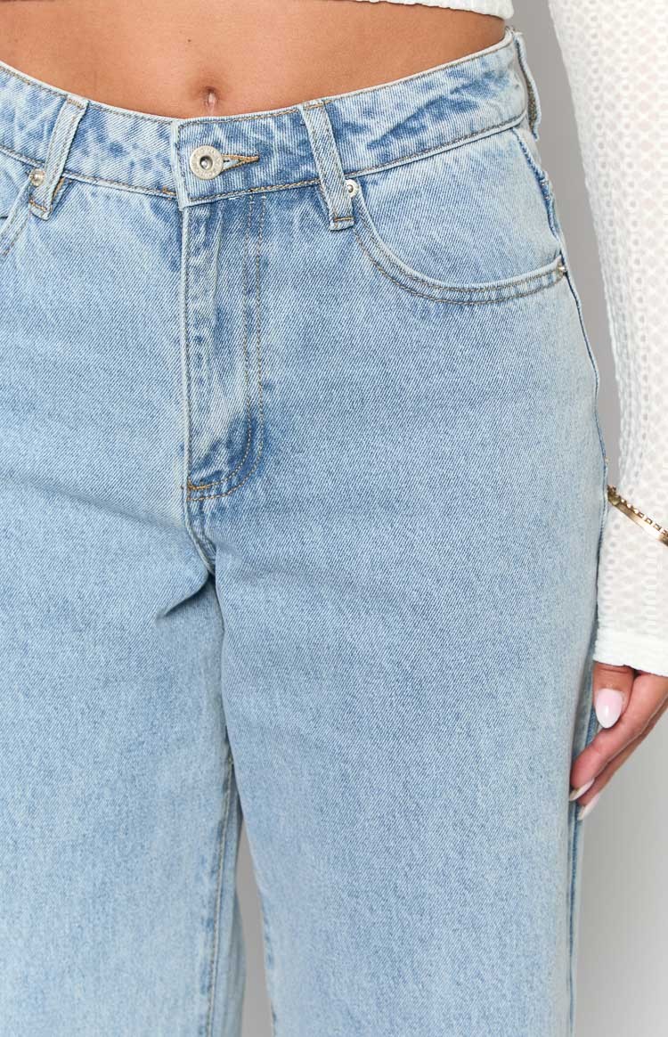 Calliope Light Wash Mid Rise Slouchy Jeans-Vavasi.All Rights Reserved.