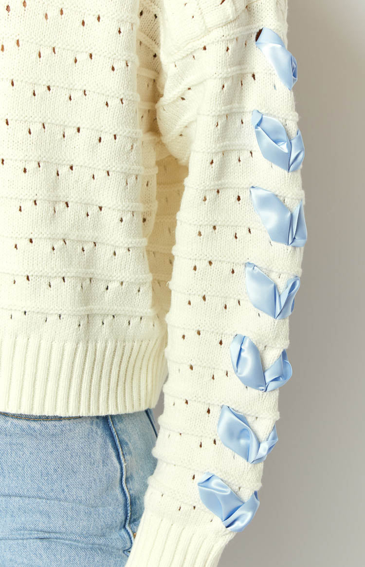 Darling White Knit Blue Ribbon Sweater-Vavasi.All Rights Reserved.