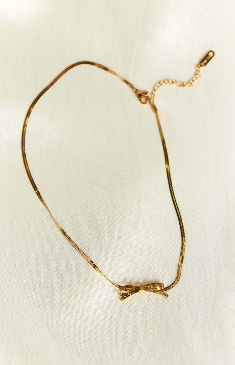 Brylee Gold Bowknot Pendant Necklace-Vavasi.All Rights Reserved.