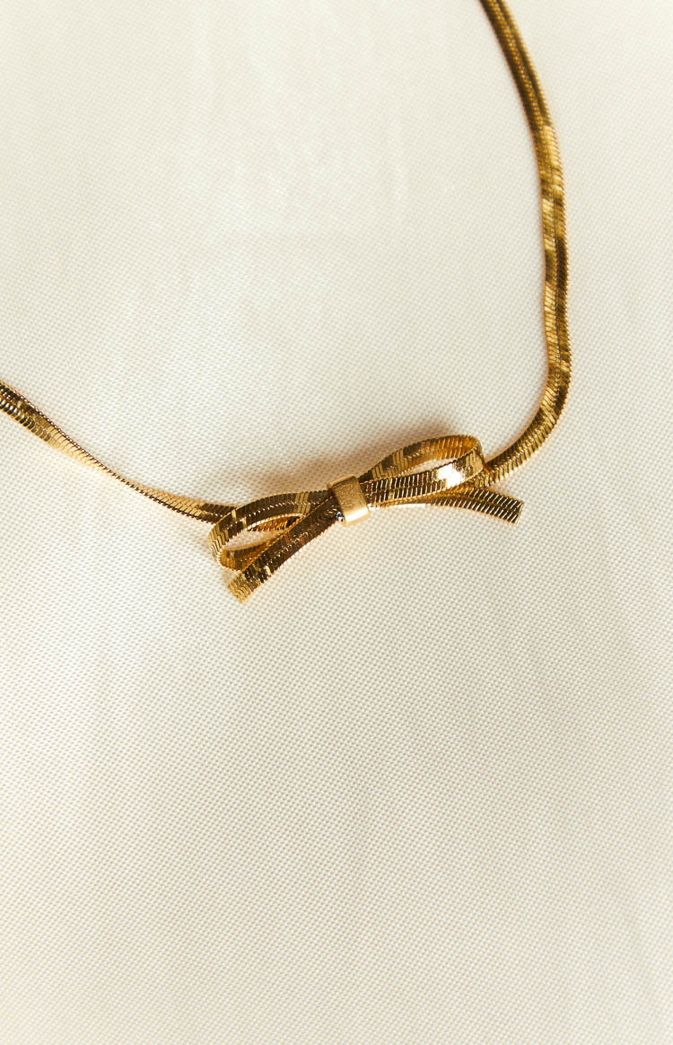 Brylee Gold Bowknot Pendant Necklace-Vavasi.All Rights Reserved.