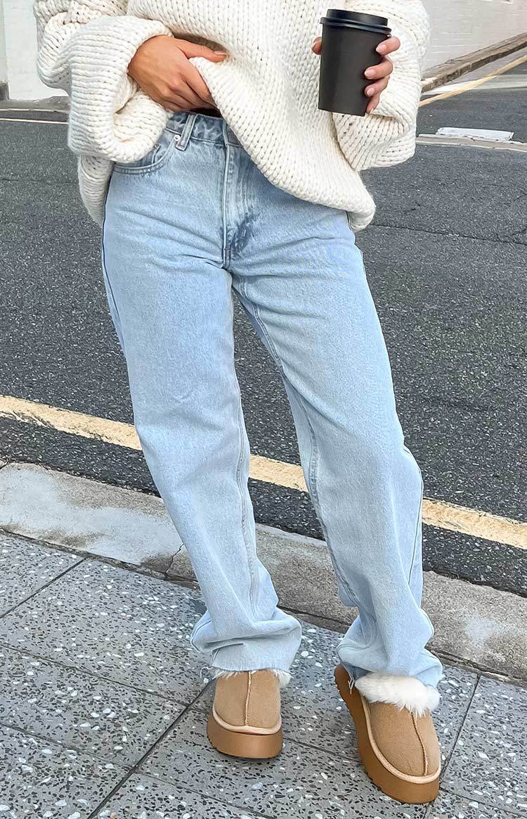Kansis Light Blue Uneven Waist Jeans-Vavasi.All Rights Reserved.