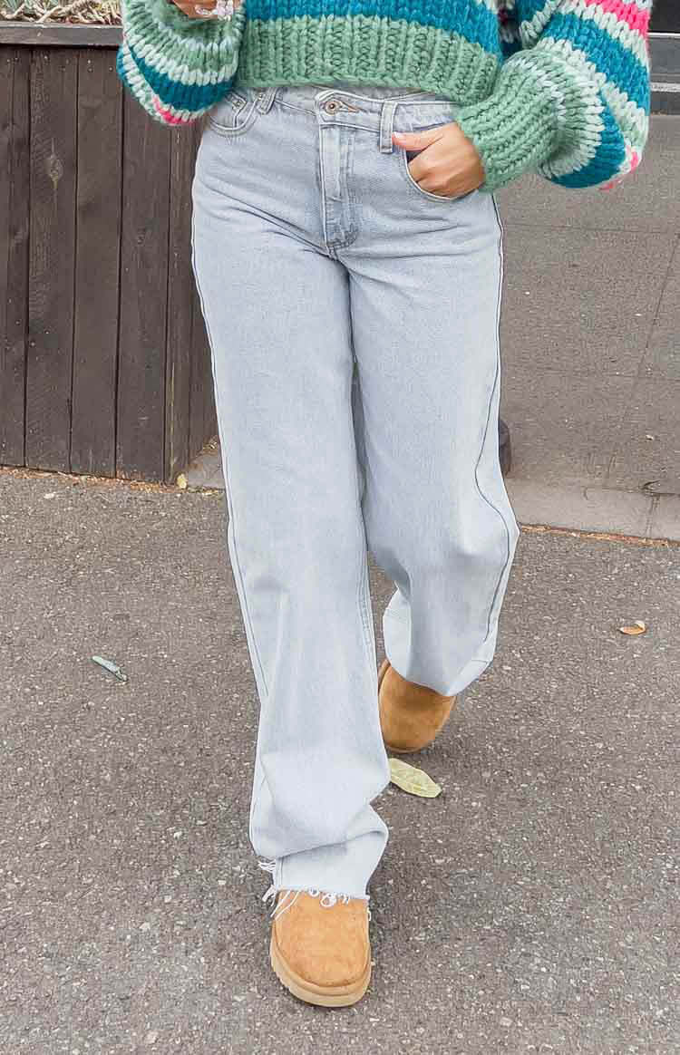 Kansis Light Blue Uneven Waist Jeans-Vavasi.All Rights Reserved.