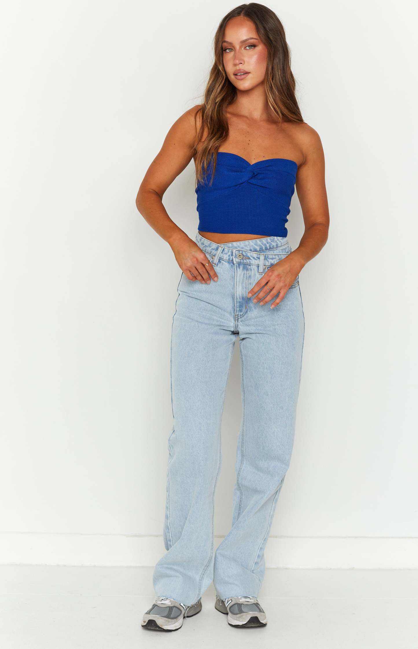 Kansis Light Blue Uneven Waist Jeans-Vavasi.All Rights Reserved.